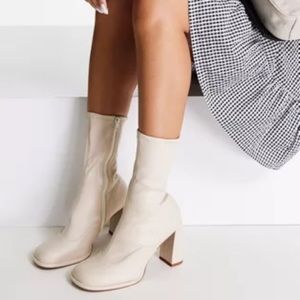 ASOS DESIGN Epsom high-heeled sock boots in cream patent